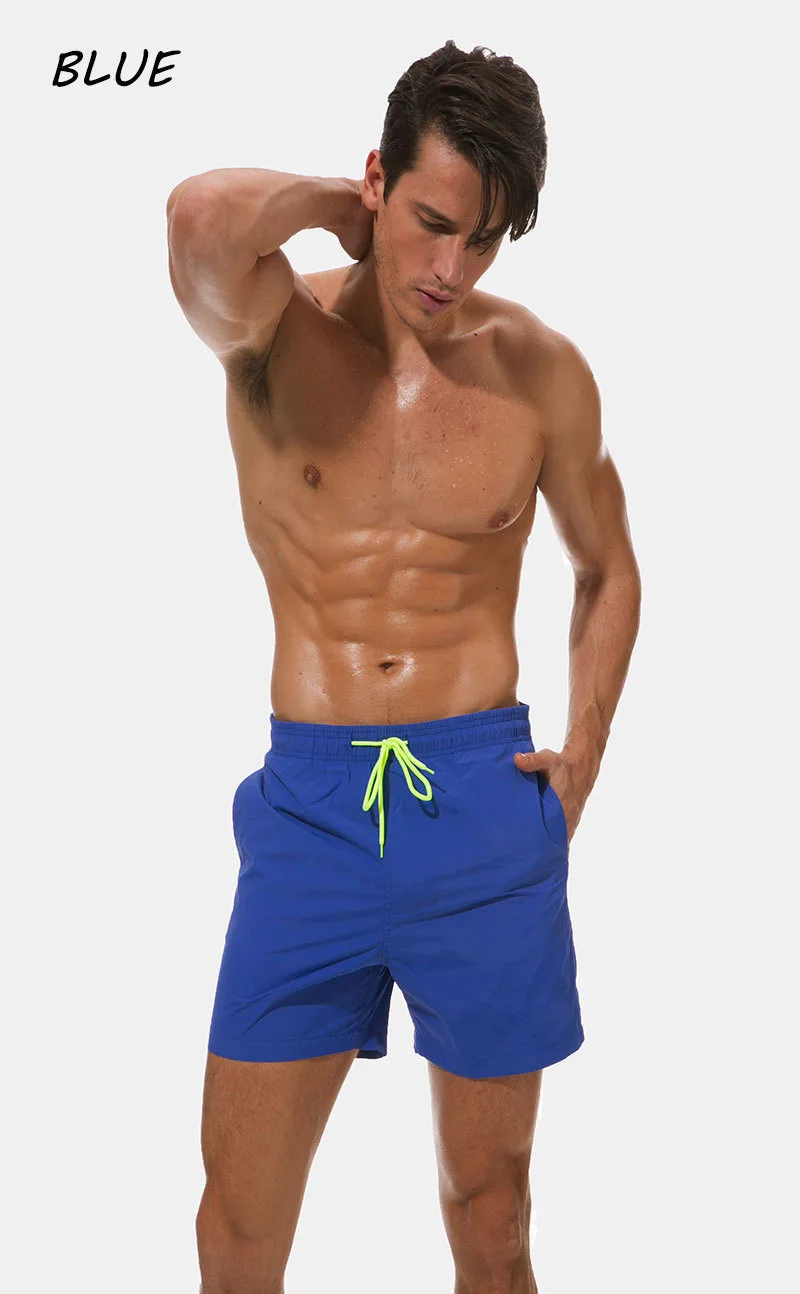 Homens verão correndo shorts de ginásio secagem