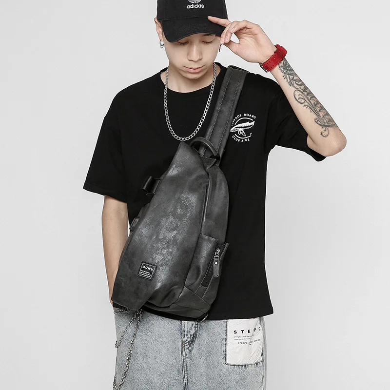 

The new chest bag men's shoulder bag messenger bag men's bag large student backpack Korean leisure fashion brand men's bag