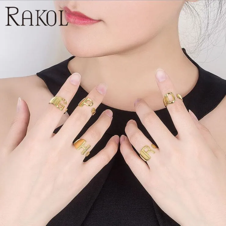 

RAKOL Simple Design 26 English Letters Open Adjustable Ring Men Women Couple Personality Hand Jewelry Anniversary Gift RR90375