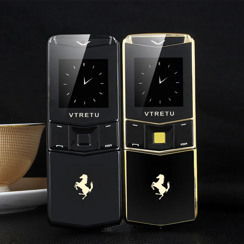 

Luxury Metal Body Slider Phone Dual Sim Bluetooth Dialer MP3 Vibration Mobile Phone With Camera FM