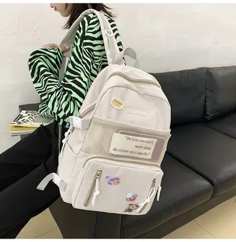 

new Korean version of ins wild casual large capacity high school students mesh backpack simple wild school bag Women's backpack