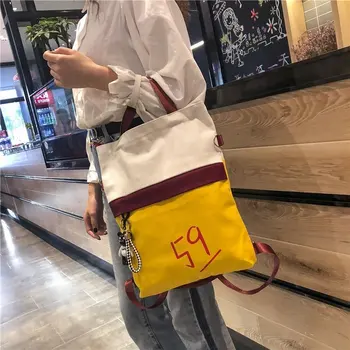 

Spring and summer new fashion trends hit the color large-capacity canvas bag single shoulder diagonal canvas women bag