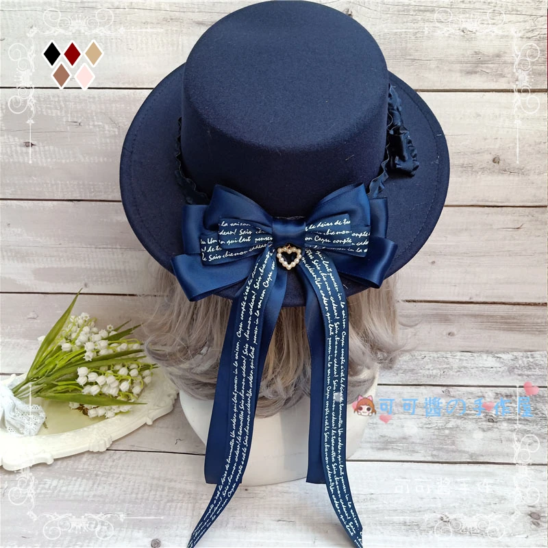 

Lolita woolen autumn and winter hat soft sister cute imitation wool velvet cap British flat top flat along the top hat bow