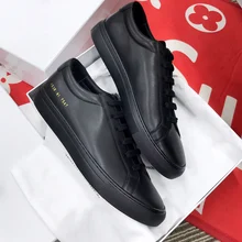 DONNIN 2021 nowe czarne płaskie wspólne sneakersy na co dzień luksusowej marki prawdziwej skóry zasznurować klasyczne buty do biegania kobiet mieszkania