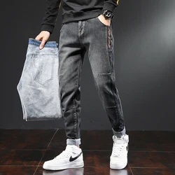 Pantalones vaqueros gruesos y cálidos para hombre, ropa de calle ajustada, de terciopelo, de alta calidad, color negro, otoño e invierno, novedad