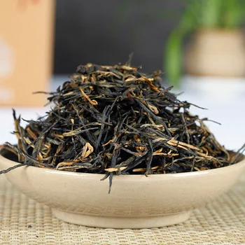 

2018 China yunnan fengqing dianhong Pine needles Black Tea for Clear heat Warm Stomach and Poria cocos