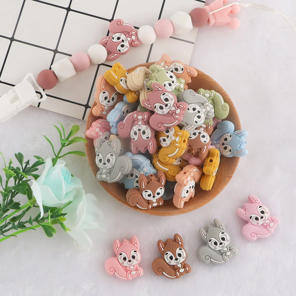 baby teething items age	 Kovict 10Pc Mini New Squirrel Silicone Beads Food Grade Teether DIY Pacifier Chain Necklace Accessories Baby Molar Toys baby teething items age	