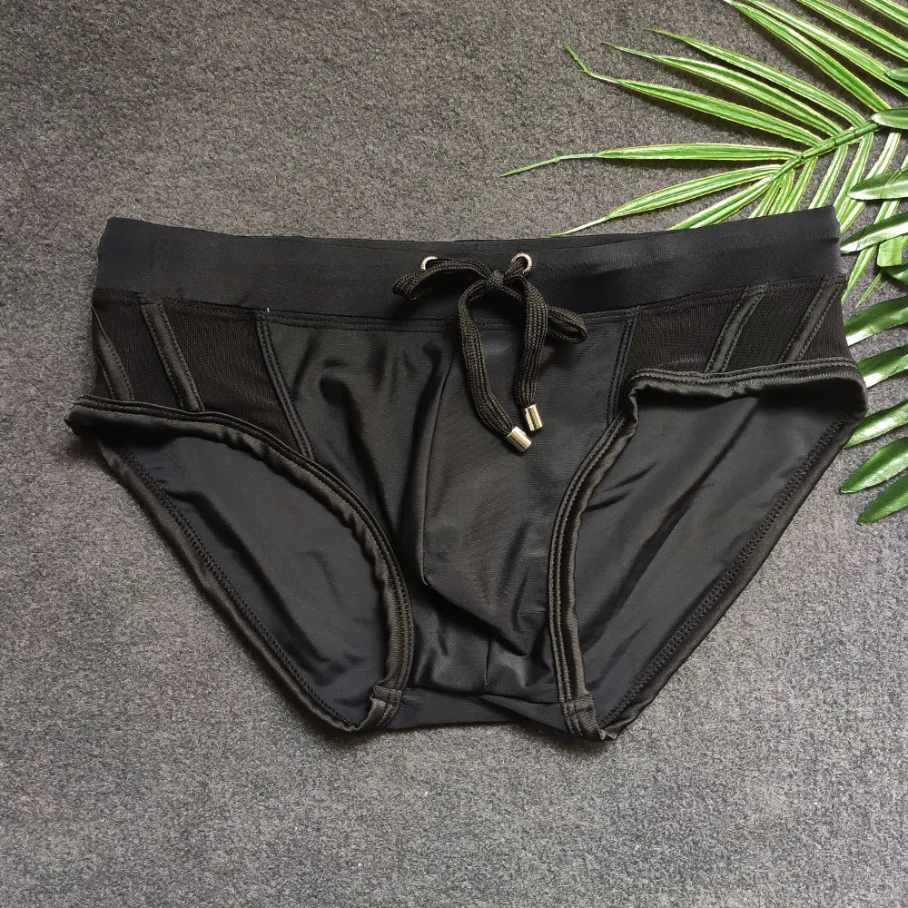 Summer Men's Black Swimwear Sexy Mesh Side Bikini Swimming Pool Briefs With/Without Sponge Pad Low Waist Solid Patchwork Bequine