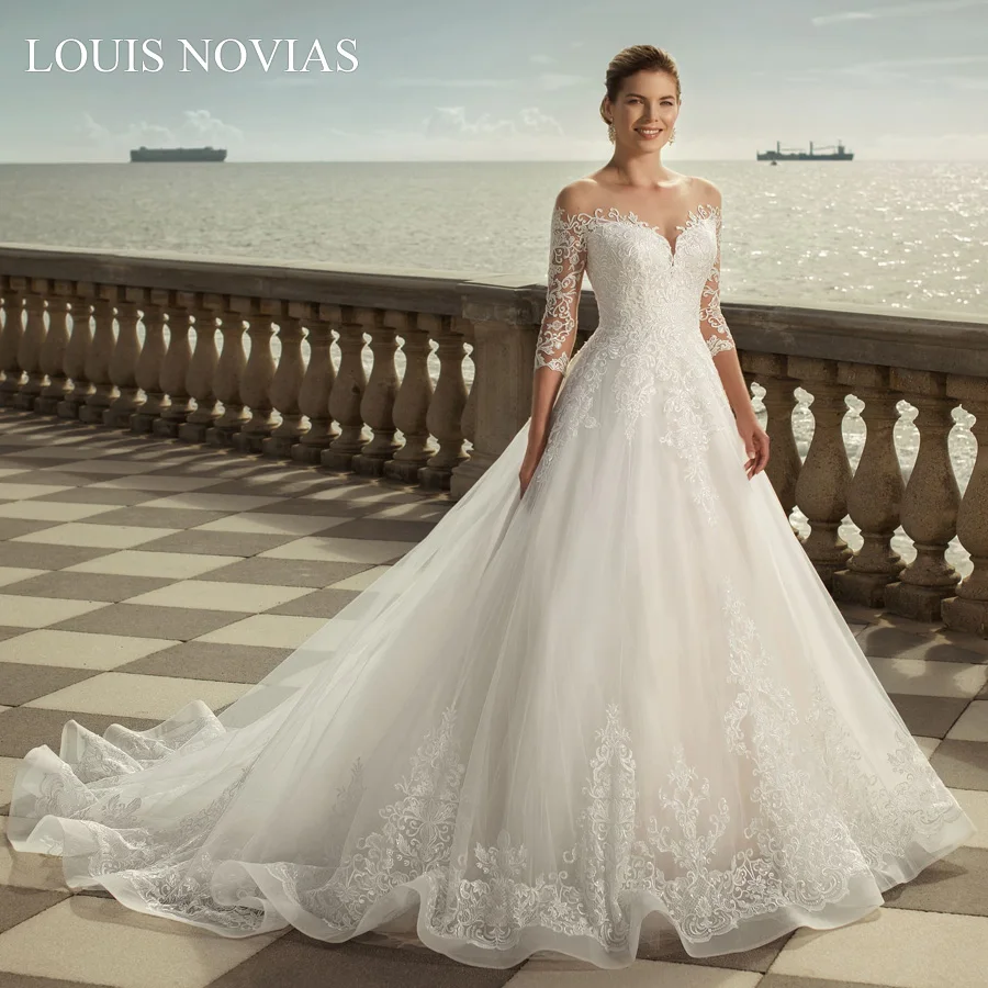 Романтическое свадебное платье Louis Novias трапециевидной формы с пуговицами