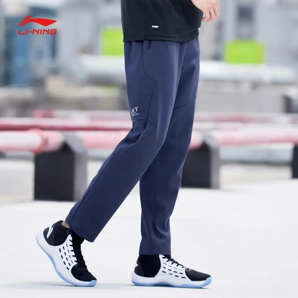Мужские тренировочные штаны Li Ning спортивные из 74% хлопка 26% полиэстера с
