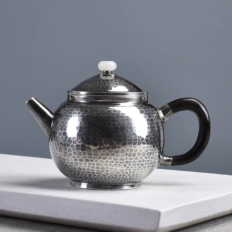 

Seiko muzzle teapot single pot household Kung Fu teapot 999 sterling silver handmade silver pot