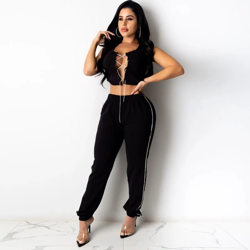 

Women Two Piece Set Chain Tie Front Hollow Out Sleeveless Crop Top And Long Pants Fashion Streetwear Club Party Clothes Outfits