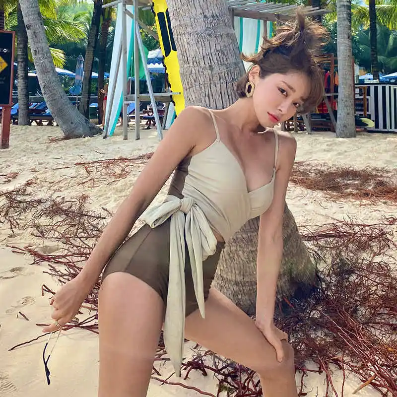 

Новинка 2021, лидер продаж, популярный купальник-бикини в южнокорейском стиле с глубоким V-образным вырезом и глубоким вырезом, соблазнительный купальник с перекрестными узлами и открытой спиной