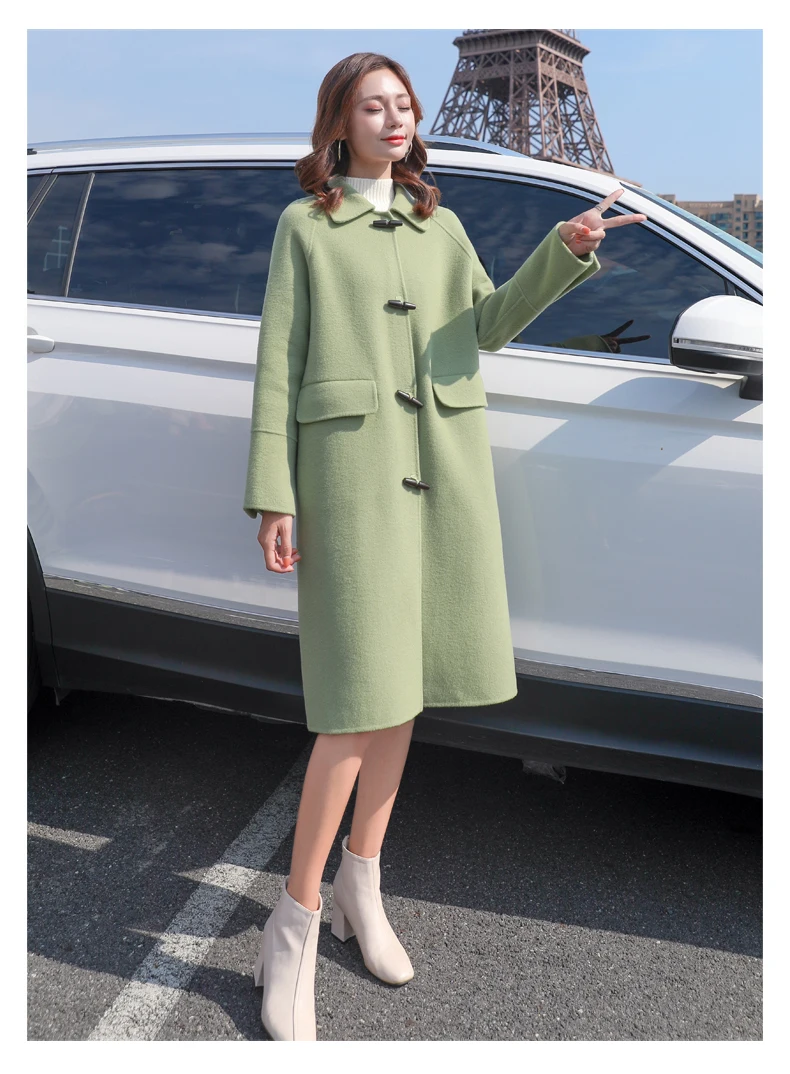 Woolen coat female long section winter new Korean version of the loose popular temperament trumpet buckle woolen