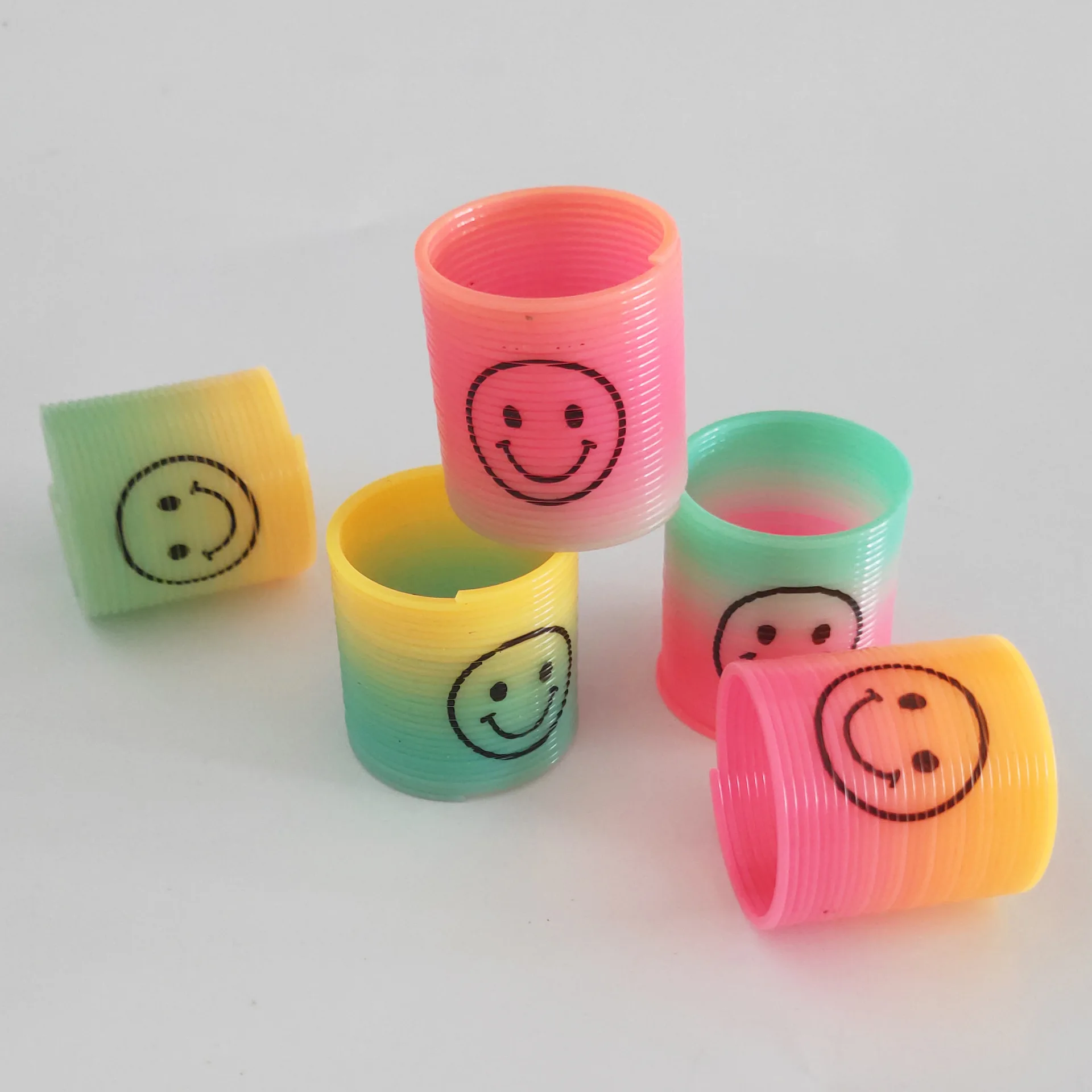 Ground Promotion Small Gift Smiley Spring Rainbow Ring Rainbow Tower Creative Children'S Educational Toy Gift 12 a Bag