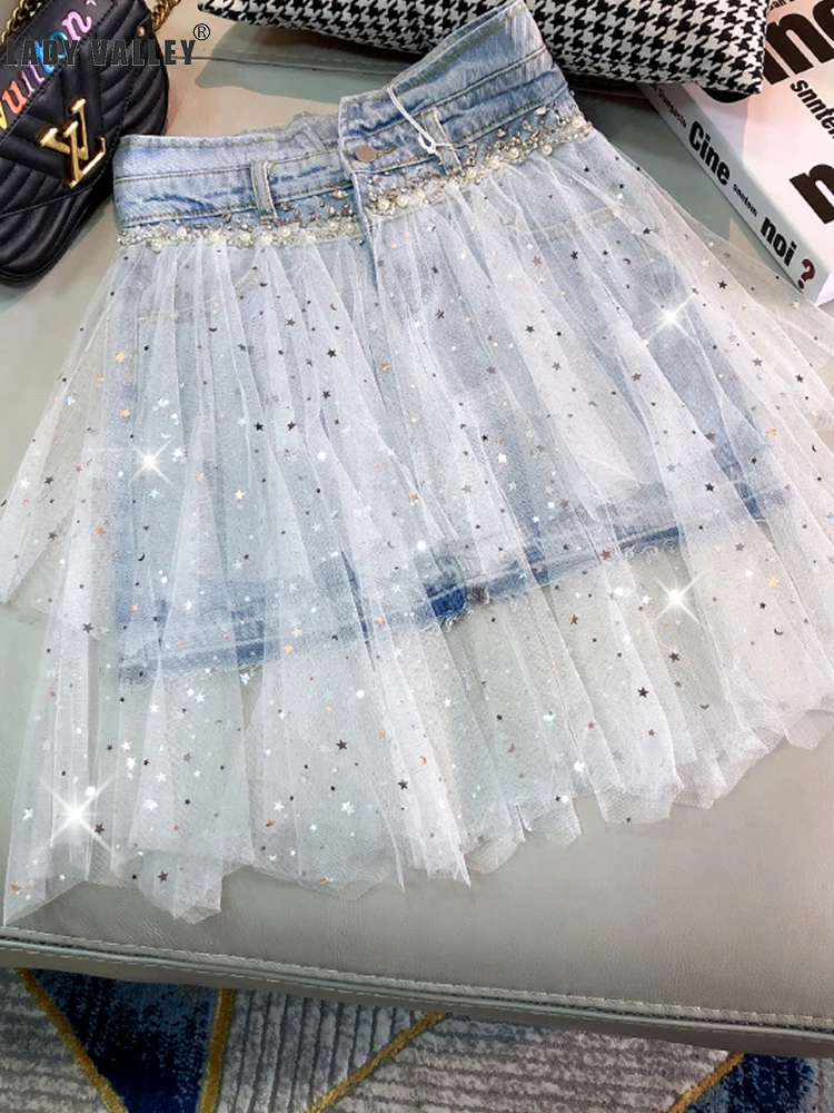 Бесплатная доставка Джинсовая юбка контрастного цвета с вышивкой бисером