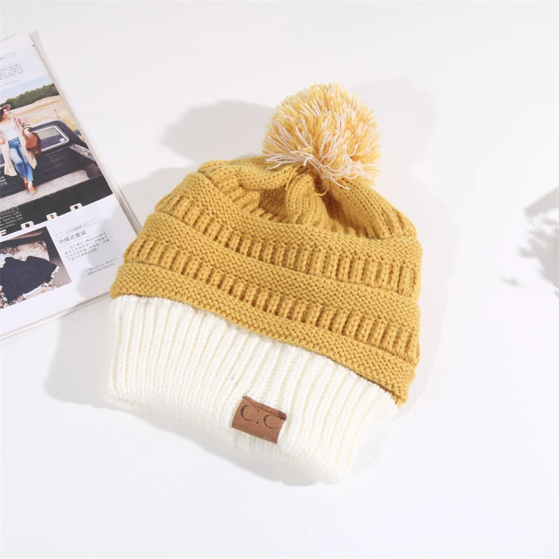 

Wool and cotton-blend Hit color knitted hat Men hat Fashion women's hat men's winter hat Keep warm winter women's hat Big pompom