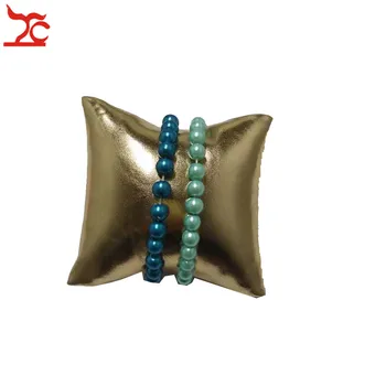 

Big Sale Fashion Gold PU Jewelry Display Cushion Soft White Leatherette Bracelet Watch Pillow Cushion Holder Stand Medium
