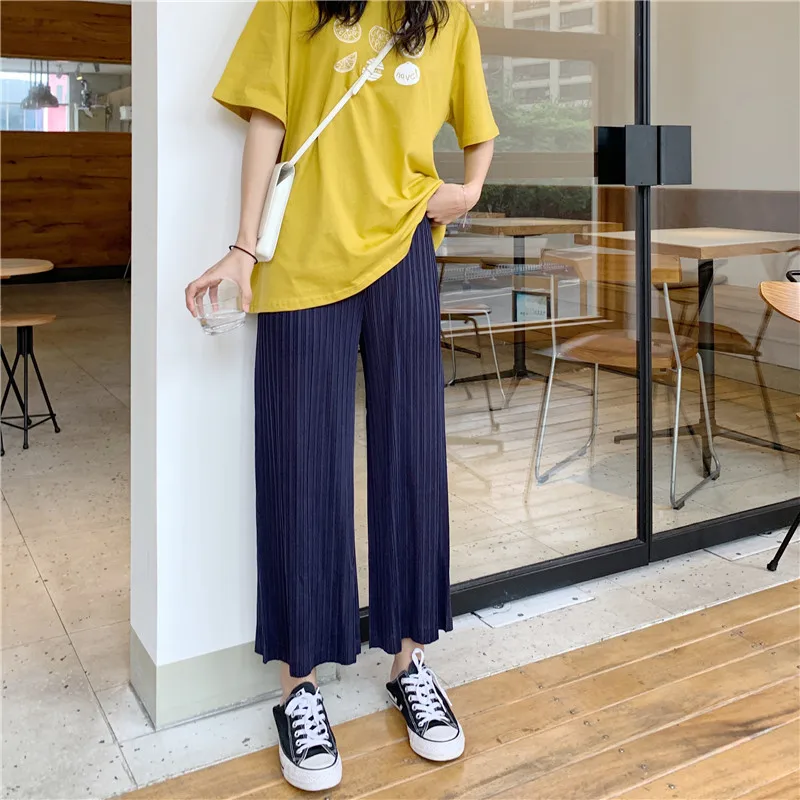 Miyake's loose slim wrinkled wide-legged pants and nine-minute pants free shipping