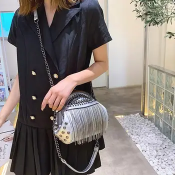

Cute retro tassel fashion shell bag girl rivet clip lock rivet design multifunctional shell shoulder messenger bag ladies