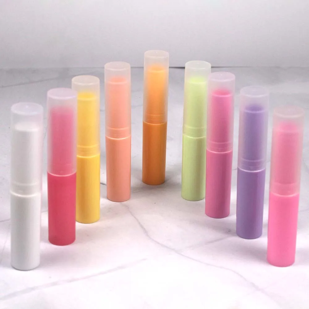 

50pcs cosmetics eco-friendly packaging case beautiful lip balm tube with transparenty cap