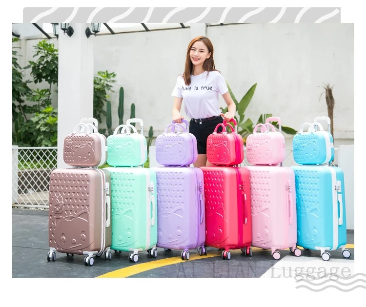 Women carry on suitcase all colors