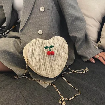 

2020 summer new fashion handmade straw weaving heart-shaped slanting vacation leisure fake beach women's bag