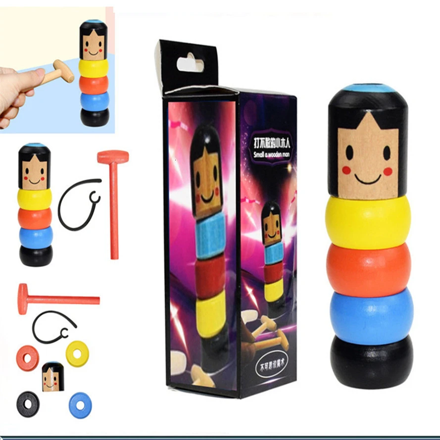 

Free Shipping Unbreakable Wooden Man Magic Toy Immortal Daruma Magic Tricks Close Up Stage Magic Props Fun Toy Accessory
