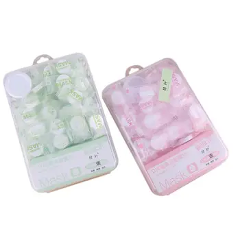 

35pcs Portable Compressed Mask Paper Non-woven Fabric Disposable Mask With A Bottle Random Color