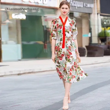 

Xiaomoli Mid sleeve temperament V-neck flower print high waist A-shaped dress in spring and summer 2020