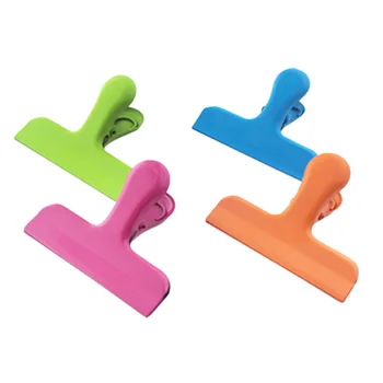 

Stainless Steel Chip Bag Clips for Food Bags, Coffee, Kitchen, Home and Office Paper Clamps Set of 4 (1 of Each Color)