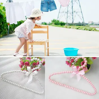 

New Plastic Pearl Curved Bow Hanger Bow Tie Decoration Children's Clothes Rack Clothes Hanger Bead Hanger for Baby Kid