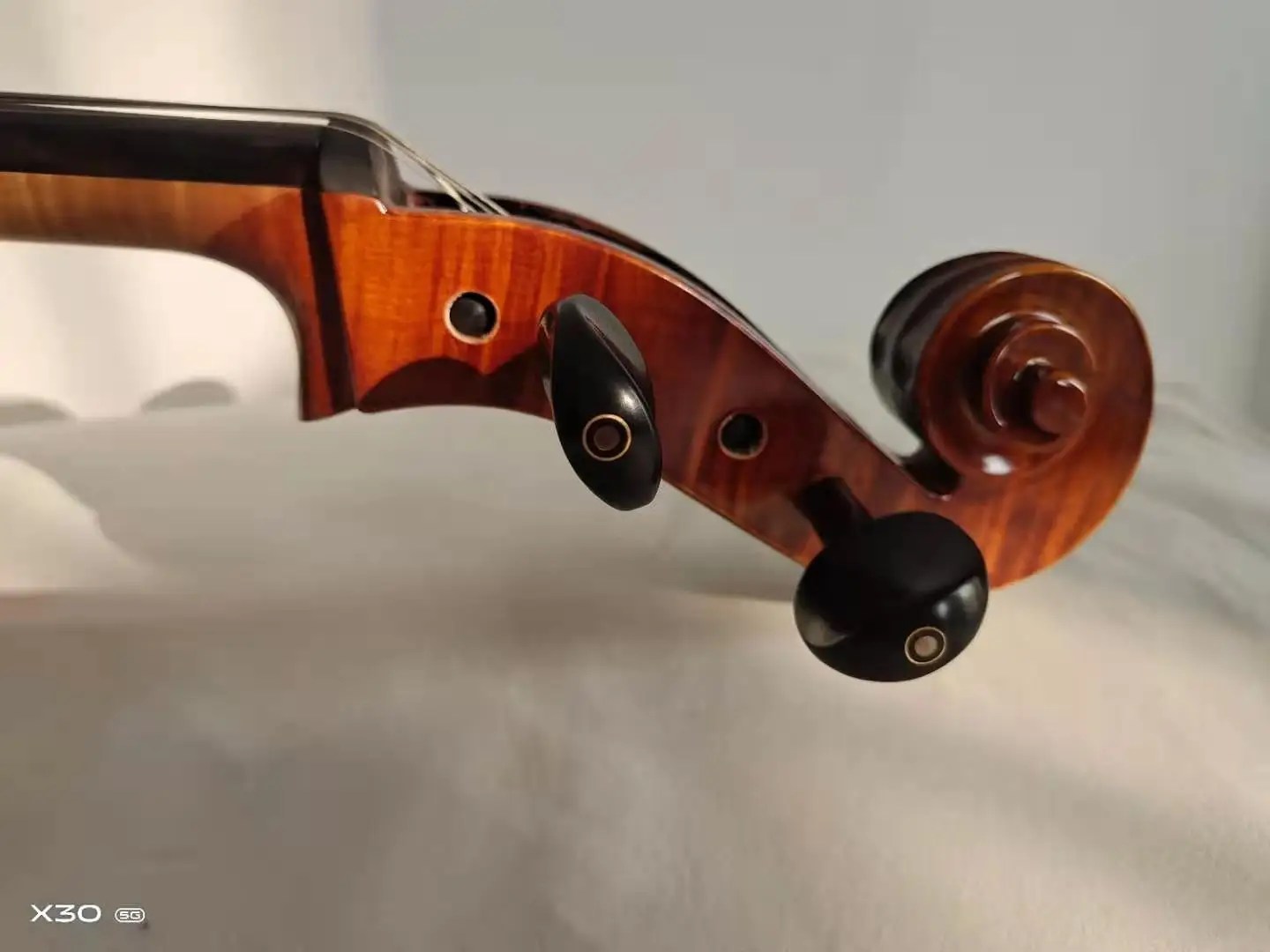 handcrafted 4/4 cello with a solid wood frame