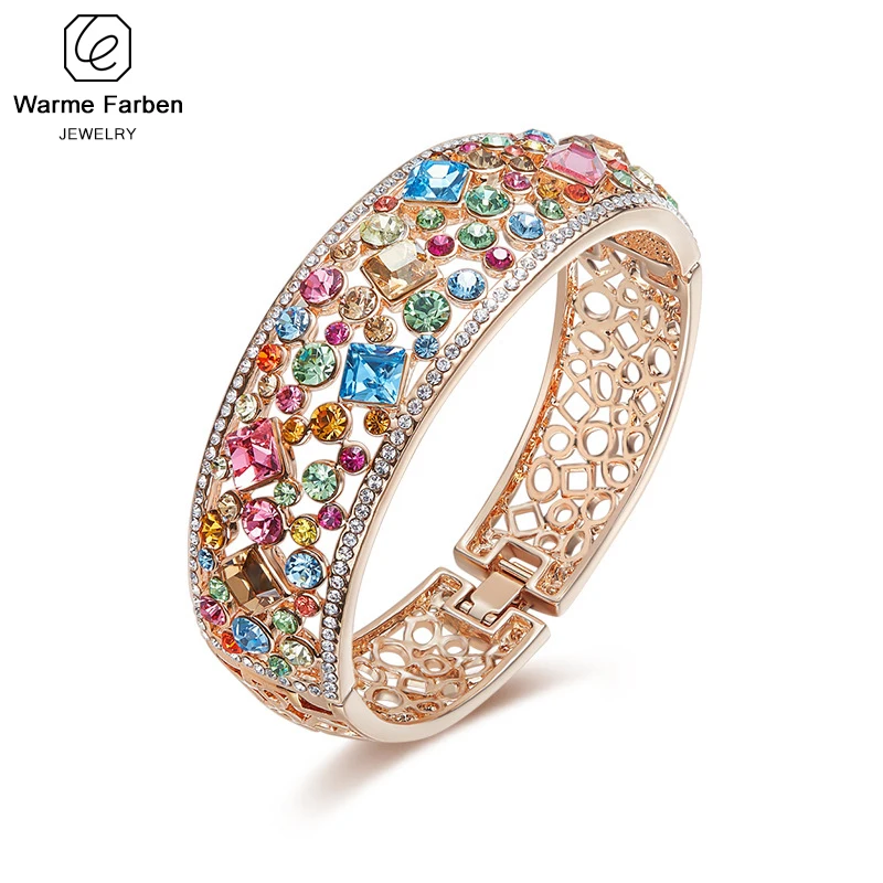 Женский браслет украшенный кристаллами Swarovski с разноцветными розового золота