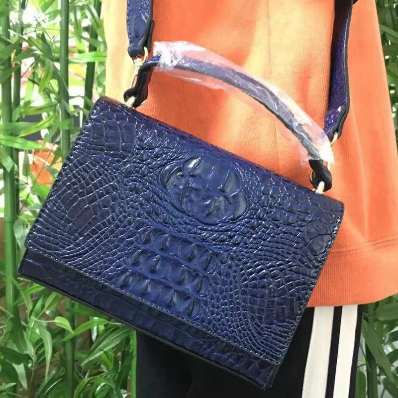 blue crocodile purse