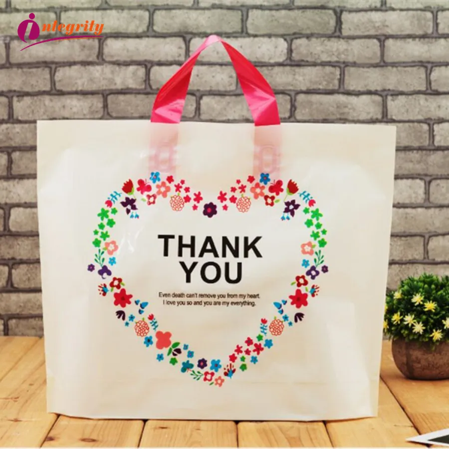 50pcs 4 Maten kleding Plastic carry bag Wedding bloemen Gift Dikke Boutique Gift Shopping Verpakking Plastic Handvat Tas 50pcs 4 Maten kleding Plastic carry bag Wedding bloemen Gift Dikke Boutique Gift Shopping Verpakking Plastic Handvat Tas
