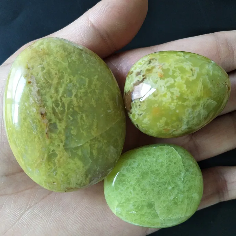 

Natural green opal palm stones playthings small stones and crystals healing crystal