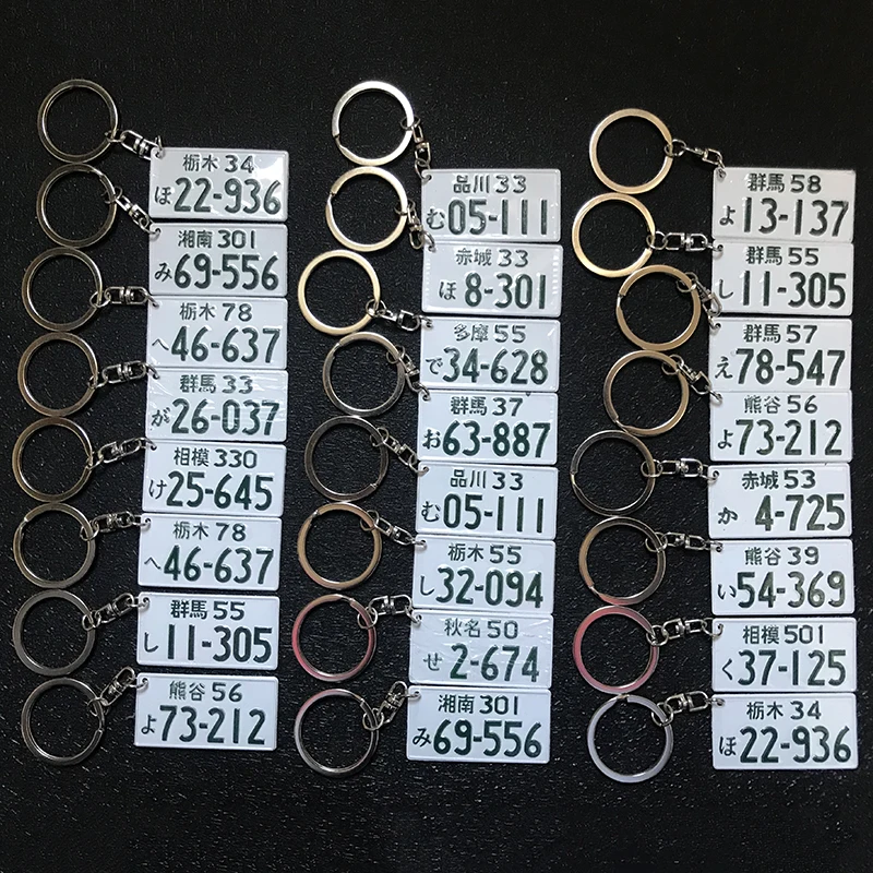 

Dropshipping 1 Pcs Hot Sale Initial D Car keychain Car Styling Japanese Kanji License Plate Key Ring JDM Racing Turbo Keychain