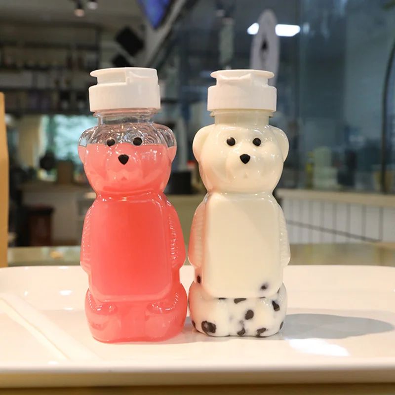 https://ae01.alicdn.com/kf/Haecd60cbdda44e6db847b463ebf18940k/Disposable-Plastic-Bear-Shaped-Cup-Cartoon-Drink-Cup-Outgoing-Pack-Milk-Coffee-Korean-Style-Juice-Glass.jpg