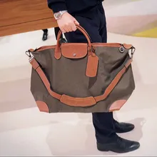 

New head layer cowhide bag classic female large dumpling packages unisex portable inclined shoulder bag