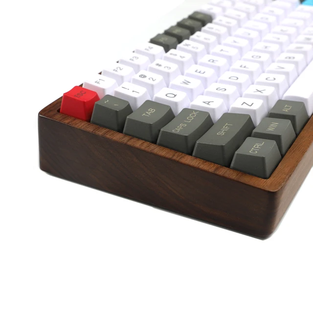 Versatile and customizable mechanical keyboard with wooden case and programmable PCB