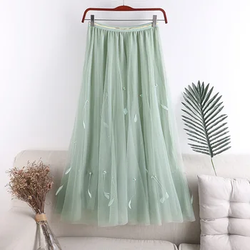 

New winter han edition joker in phnom penh waist head long nail bead feathers white gauze a-line skirts female skirt 722
