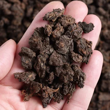 

Wholesale Yunnan Aged Pu'er Tea 2005 Spring Tea Golden Bud Big Tree Old Tea Head Natural Tuo Cooked Tea Factory Direct Sales