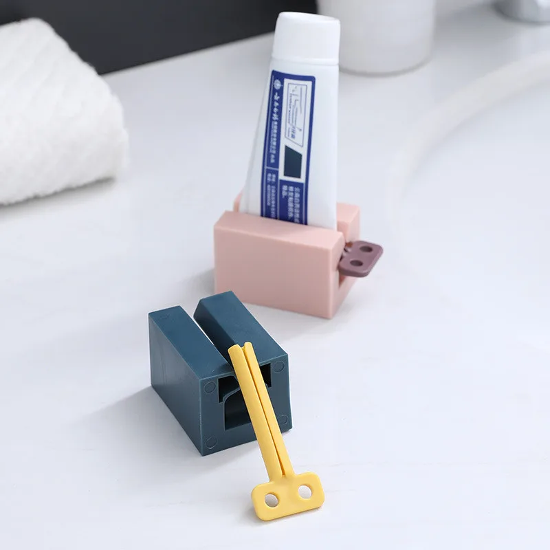 Exprimidor de pasta de dientes Tubo dispensador de pasta de dientes para niños, limpiador Facial, prensa, Soporte rodante, accesorios de baño, nuevo