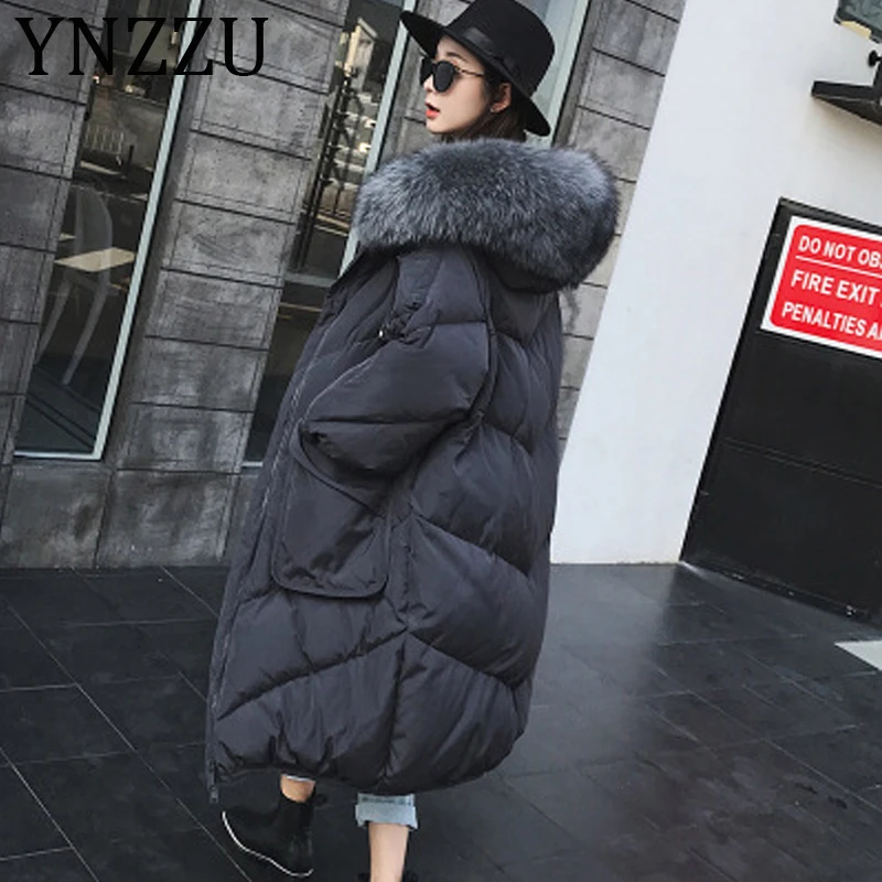 

YNZZU Korean Style 2019 New Winter Women's Down Jacket Casual Long with Real Fur Collar Hooded Thicken Warm Coat Plus Size A1150
