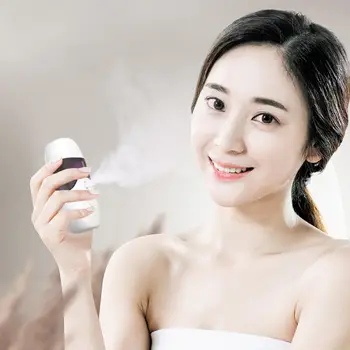 

Small Nano Spray Water Replenishing Instrument Sprayer Portable Handheld Humidifier Nano Mist Sprayer