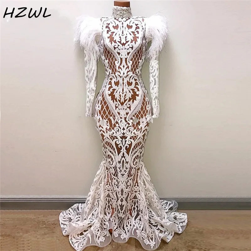 

See Through Mermaid Evening Dresses With Long Sleeves Lace Appliques Feathers Dubai African Prom Dress Long Sleeves High Neck