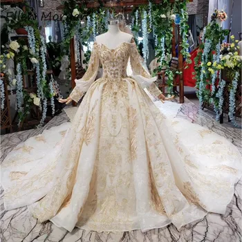 

Luxury Gold Lace Ball Gowns Wedding Dresses Sweetheart Long Sleeve Beads Applique Cathedral Train Bride Gowns 2019 Middle East