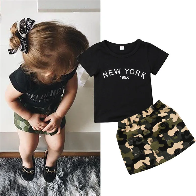 

Baby Girls Summer Clothes Toddler Round Neck Short Sleeve Print Letter Top and Button Pocket Camouflage Skirts 2pc Outfits