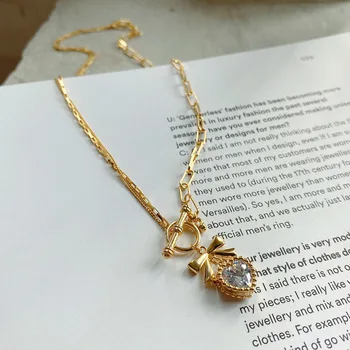 

18K Gold 100% Authentic 925 Sterling silver asymmetry necklace Mothers' Gift Bowknot &Love Heart cz Toggle Pendant TLX2141
